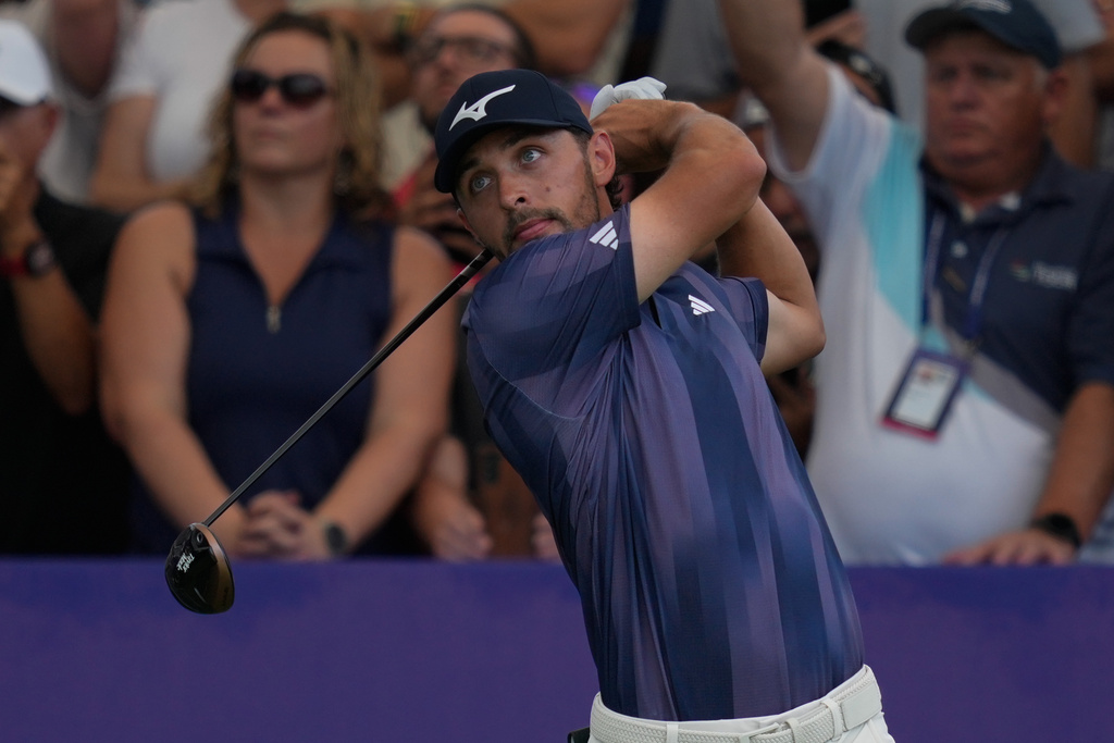 Marco Penge of England hits off the first tee during the first round of World Tour Golf Championship at Jumeirah Golf Estates, in Dubai, United Arab Emirates, Thursday, Nov. 13, 2025. (AP Photo/Altaf Qadri)