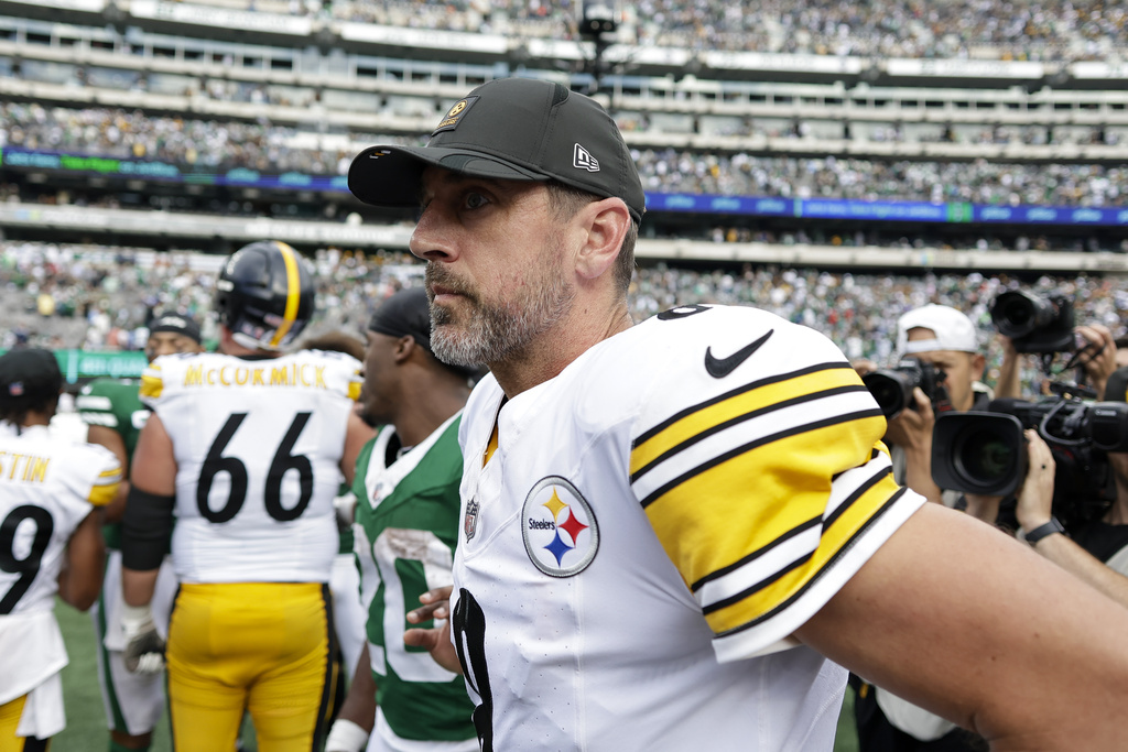 Pittsburgh Steelers quarterback Aaron Rodgers walks on the field following an NFL football game against the New York Jets Sunday, Sept. 7, 2025, in East Rutherford, N.J. (AP Photo/Adam Hunger)