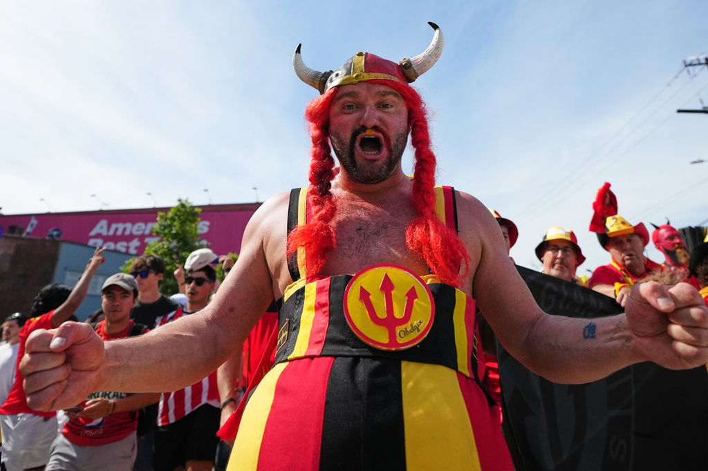 A Belgium fan cheers during a march to the stadium before the World Cup Group G soccer match between Egypt and Belgium in Seattle, Monday, June 15, 2026. (AP Photo/Lindsey Wasson)