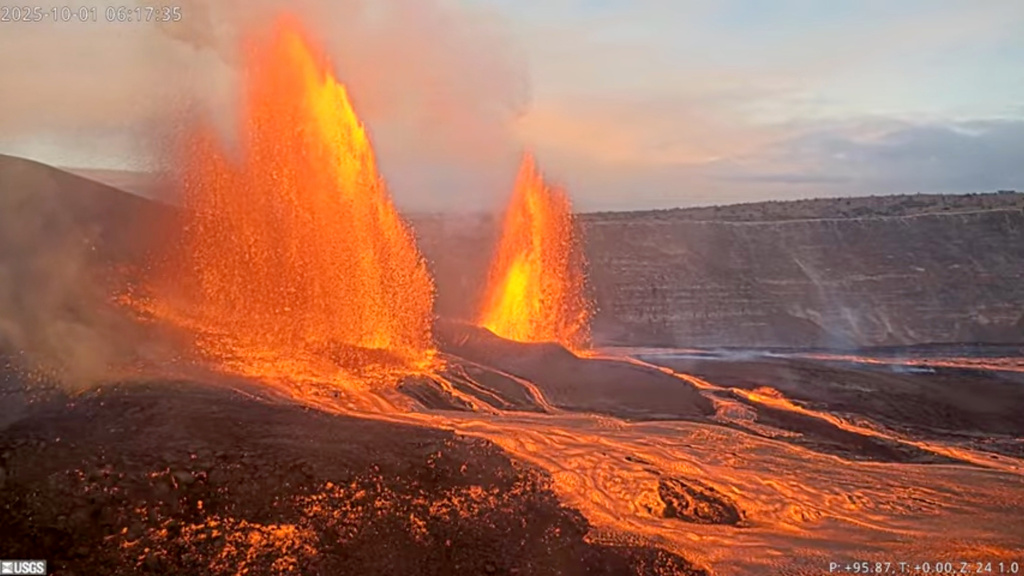 This image from webcam footage provided by the United States Geological Survey (USGS) shows lava fountains shooting up in the air in the latest episode of an ongoing eruption of Kilauea volcano inside Hawaii Volcanoes National Park on Wednesday, Oct. 1, 2025, in Hawaii. (U.S. Geological Survey via AP)