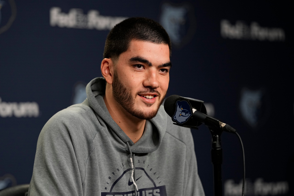 Memphis Grizzlies center Zach Edey speaks during the NBA basketball team's media day Monday, Sept. 28, 2026, in Memphis, Tenn. (AP Photo/George Walker IV)
