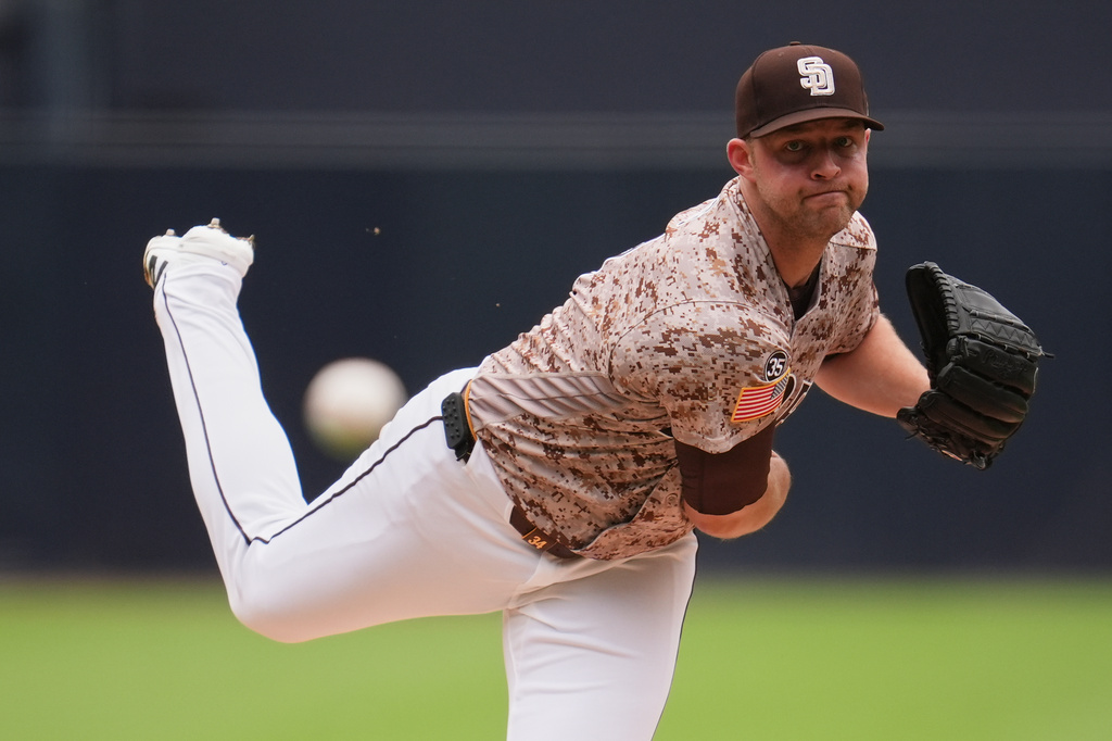 San Diego Padres starting pitcher Michael King works against an Athletics batter during the first inning of a baseball game Sunday, May 24, 2026, in San Diego. (AP Photo/Gregory Bull)
