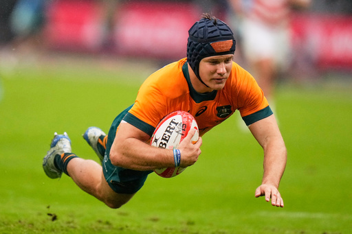 Australia's Josh Flook scores a try during a rugby test between the Wallabies and Japan in Tokyo, Saturday, Oct. 25, 2025. (AP Photo/Shuji Kajiyama) Australia's Josh Flook scores a try during a rugby test between the Wallabies and Japan in Tokyo, Saturday, Oct. 25, 2025. (AP Photo/Shuji Kajiyama)