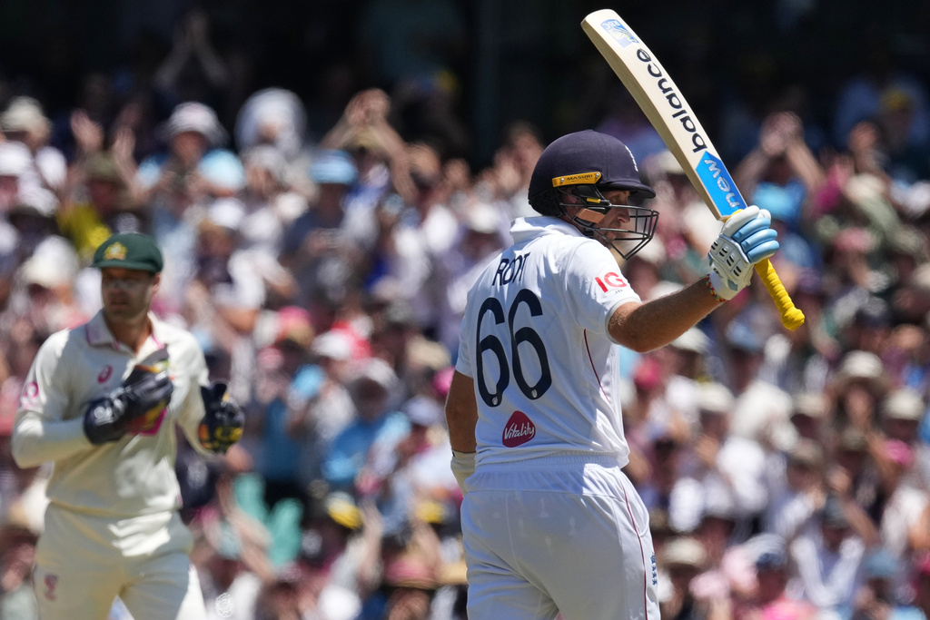 England's Joe Root reacts after scoring 150 runs during play on day two of the fifth and final Ashes cricket test between England and Australia in Sydney, Monday, Jan. 5, 2026. (AP Photo/Mark Baker)