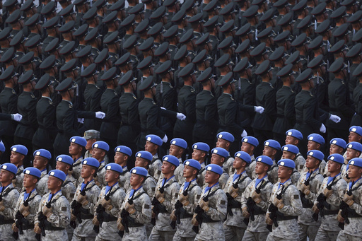 Military personnel take part in a military parade to commemorate the 80th anniversary of the end of World War II held in front of Tiananmen Gate in Beijing, China, Wednesday, Sept. 3, 2025. (Alexander Kazakov, Sputnik, Kremlin Pool Photo via AP) Military personnel take part in a military parade to commemorate the 80th anniversary of the end of World War II held in front of Tiananmen Gate in Beijing, China, Wednesday, Sept. 3, 2025. (Alexander Kazakov, Sputnik, Kremlin Pool Photo via AP)