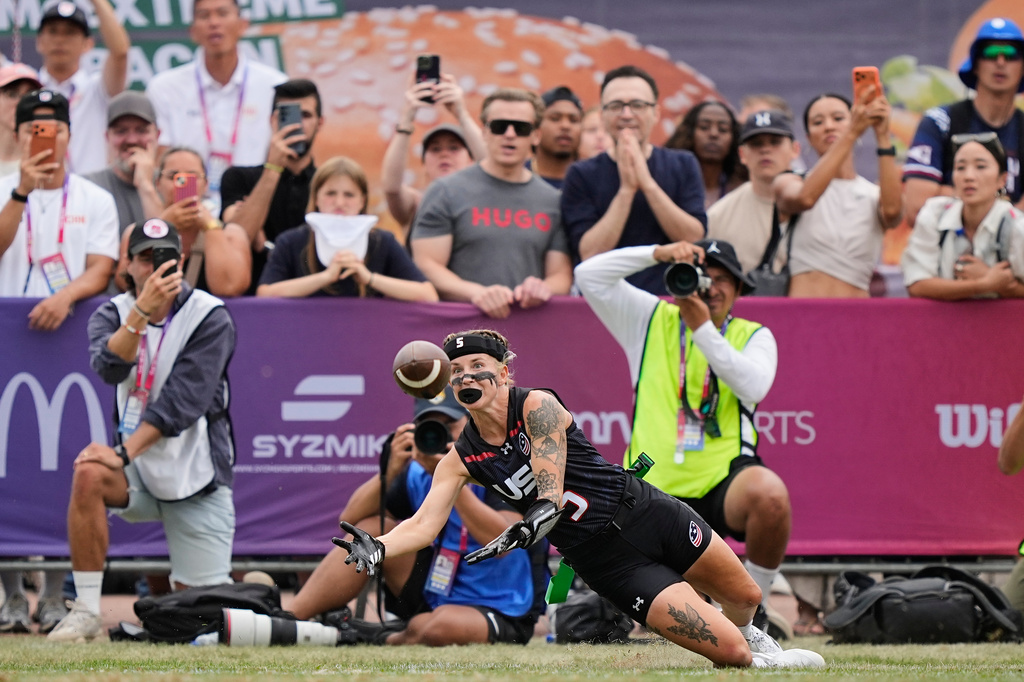 Madison Fulford of the United States misses the last chance during the Flag Football World Championship women's final game between Canada and USA in Duesseldorf, Germany, Sunday, Aug. 16, 2026. (AP Photo/Martin Meissner)