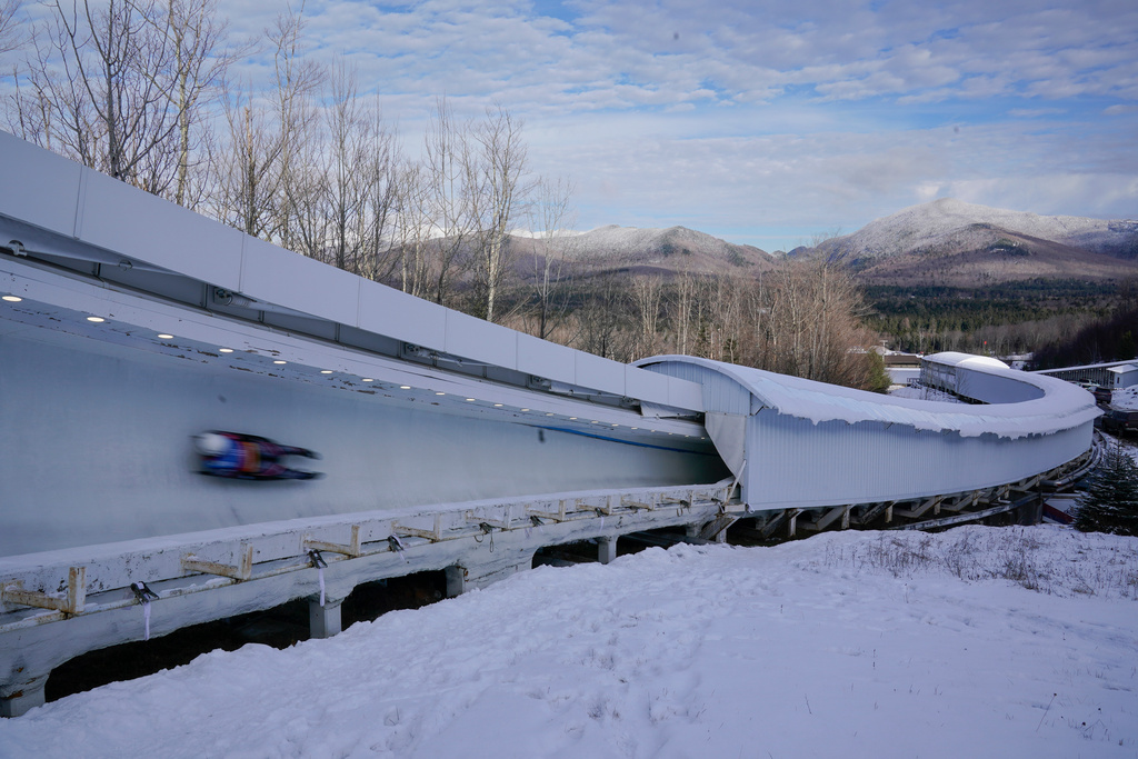 FILE - A luger slides down the track during the World Cup luge event in Lake Placid, N.Y., Dec. 8, 2023. (AP Photo/Seth Wenig, File)