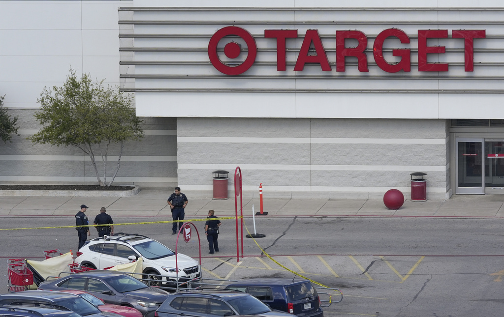 Police work at the scene of a shooting at a Target in Austin, Texas, Monday, Aug. 11, 2025. (Jay Janner/Austin American-Statesman via AP)