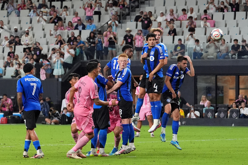 CF Montreal defenders watch as a free kick by Inter Miami forward Lionel Messi, not pictured, sails past them to score the side's seventh goal in stoppage time and end their MLS soccer match, Saturday, Aug. 29, 2026, in Miami. (AP Photo/Rebecca Blackwell)