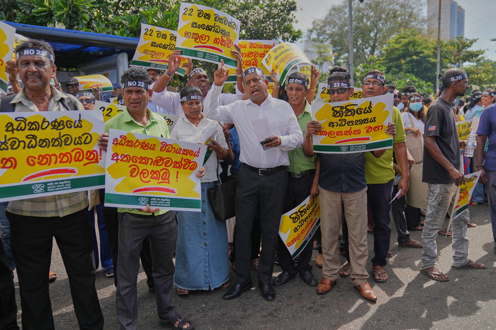 Sri Lanka's opposition supporters hold placard reading "Hands off independence of judiciary" during a protest in Colombo, Sri Lanka, Thursday, Sept. 3, 2026. (AP Photo/Eranga Jayawardena)