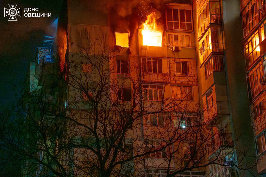 In this photo provided by the Ukrainian Emergency Service, a fire is seen in a residential building following a Russian drone attack in Odesa, Ukraine, Friday, May 1, 2026. (Ukrainian Emergency Service via AP)
