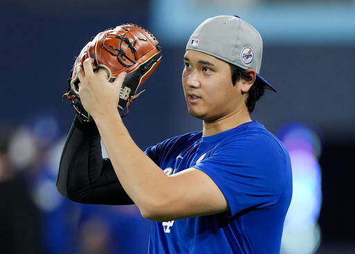 Los Angeles Dodgers' Shohei Ohtani rehearses his pitch during batting practice ahead of game 6 of the World Series against the Los Angeles Dodgers in Toronto on Thursday, Oct. 30, 2025. (/Nathan Denette/The Canadian Press via AP) Los Angeles Dodgers' Shohei Ohtani rehearses his pitch during batting practice ahead of game 6 of the World Series against the Los Angeles Dodgers in Toronto on Thursday, Oct. 30, 2025. (/Nathan Denette/The Canadian Press via AP)