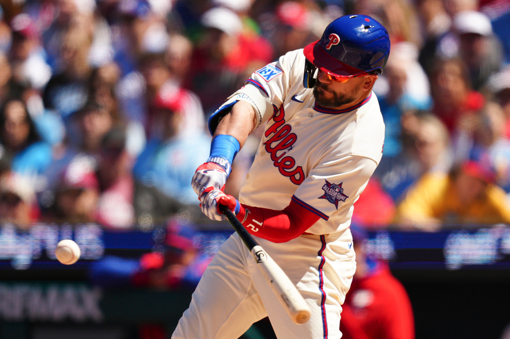 Philadelphia Phillies' Kyle Schwarber hits a three-run home run off Arizona Diamondbacks pitcher Brandon Pfaadt during the third inning of a baseball game, Saturday, April 11, 2026, in Philadelphia. (AP Photo/Derik Hamilton)