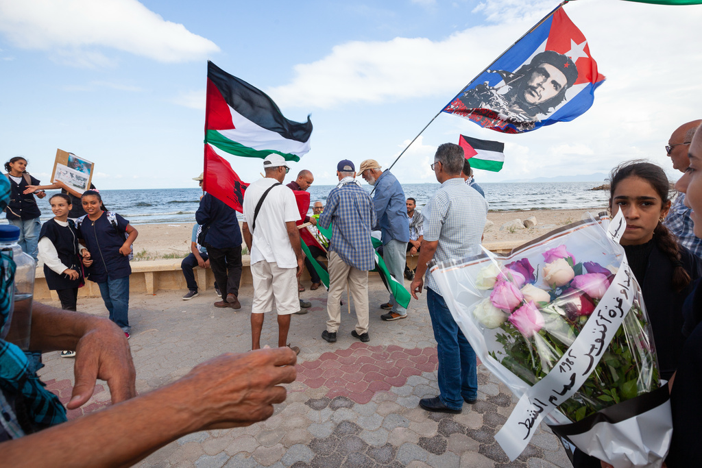 Demonstrators gather at a memorial site honoring the victims of the 1985 Israeli attack on Palestine Liberation Organization's headquarters, in Hammam Chott outside Tunisia's capital, Tunisia, Wednesday, Oct. 1, 2025. (AP Photo/Ons Abid)