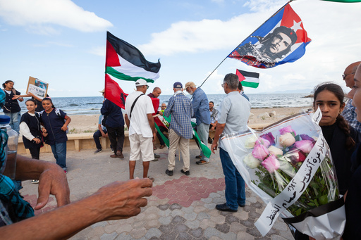 Demonstrators gather at a memorial site honoring the victims of the 1985 Israeli attack on Palestine Liberation Organization's headquarters, in Hammam Chott outside Tunisia's capital, Tunisia, Wednesday, Oct. 1, 2025. (AP Photo/Ons Abid) Demonstrators gather at a memorial site honoring the victims of the 1985 Israeli attack on Palestine Liberation Organization's headquarters, in Hammam Chott outside Tunisia's capital, Tunisia, Wednesday, Oct. 1, 2025. (AP Photo/Ons Abid)