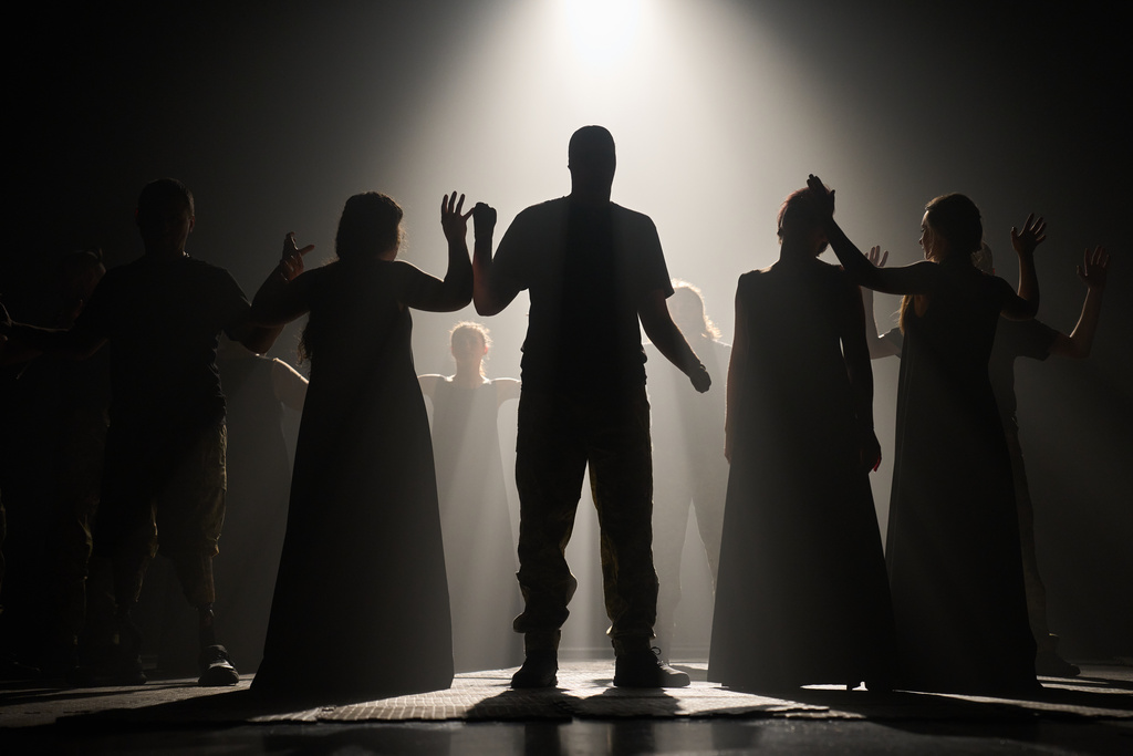 Ukrainian war veterans, many of whom sustained severe injuries in combat during Russia's full-scale invasion of Ukraine, perform during a premiere on Thursday, Feb. 19, 2026, in Kyiv, Ukraine. (AP Photo/Efrem Lukatsky)