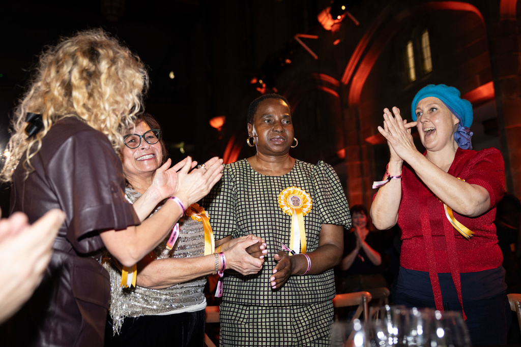 Nnena Kalu, second from right, is announced as the winner of the Turner Prize 2025 at a ceremony at Bradford Grammar School, in Bradford, England, Tuesday Dec. 9, 2025. (James Speakman/PA via AP)