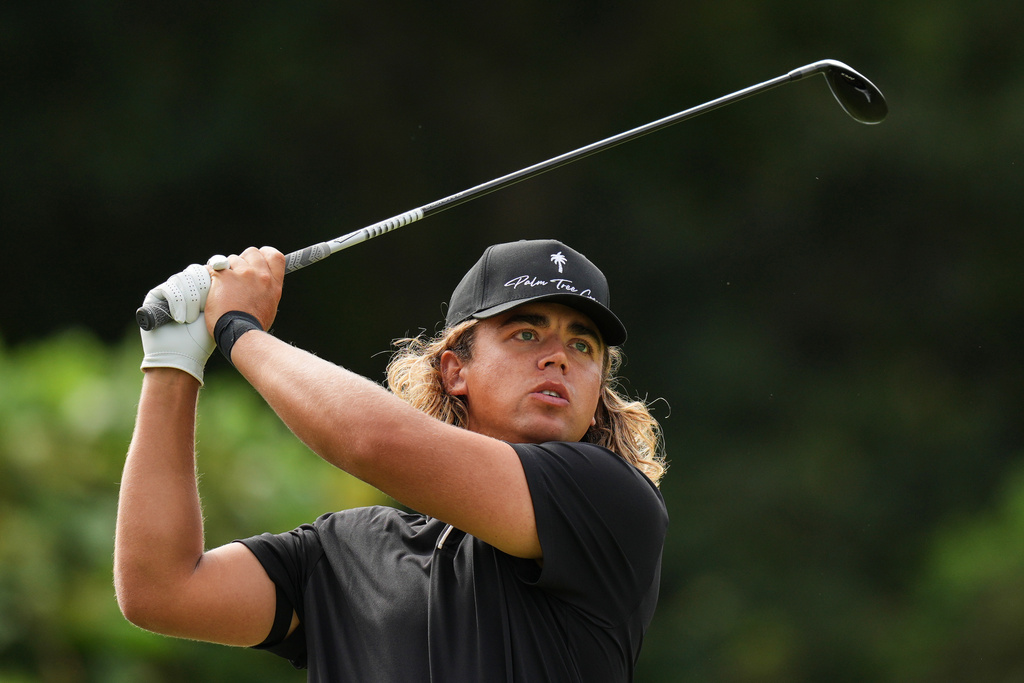 Garrick Higgo, of South Africa, tees off on the second hole during the fourth round of the Baycurrent Classic golf tournament at the Yokohama Country Club in Yokohama, near Tokyo, Sunday, Oct. 12, 2025. (AP Photo/Hiro Komae)