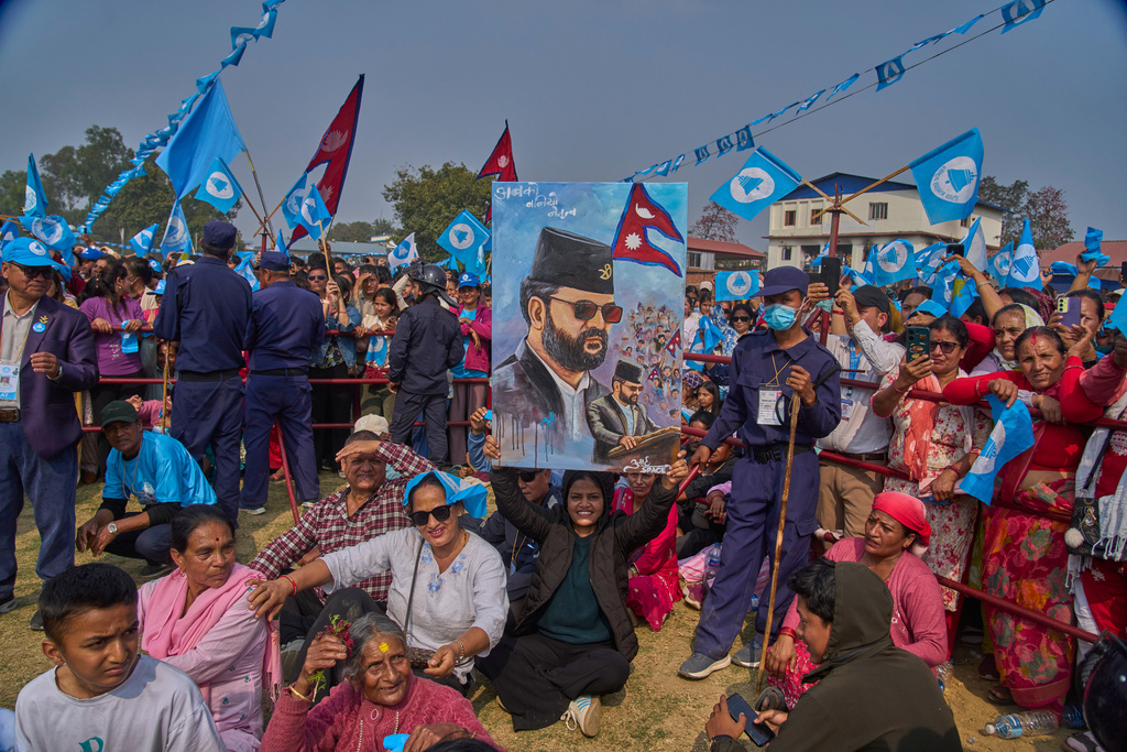Supporters of the Rastriya Swatantra Party shout slogans as they wait for the arrival of rapper-turned-politician Balendra Shah during an election campaign rally in Chitwan, approximately 180 kilometers (112 miles) west of Kathmandu, Nepal, Friday, Feb. 27, 2026. (AP Photo/Niranjan Shrestha)