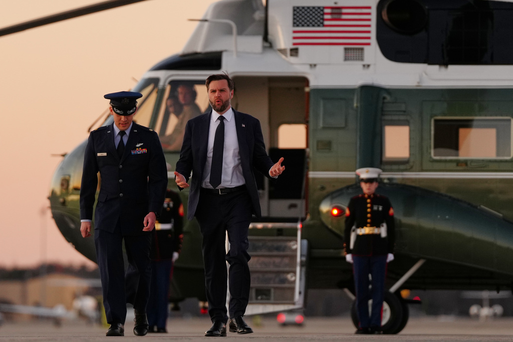 Vice President JD Vance walks to board Air Force Two, Monday, March 9, 2026, at Joint Base Andrews, Md., to attend the casualty return for Sgt. Benjamin N. Pennington, 26, of Glendale, Ky., at Dover Air Force Base, Del. (AP Photo/Julia Demaree Nikhinson)