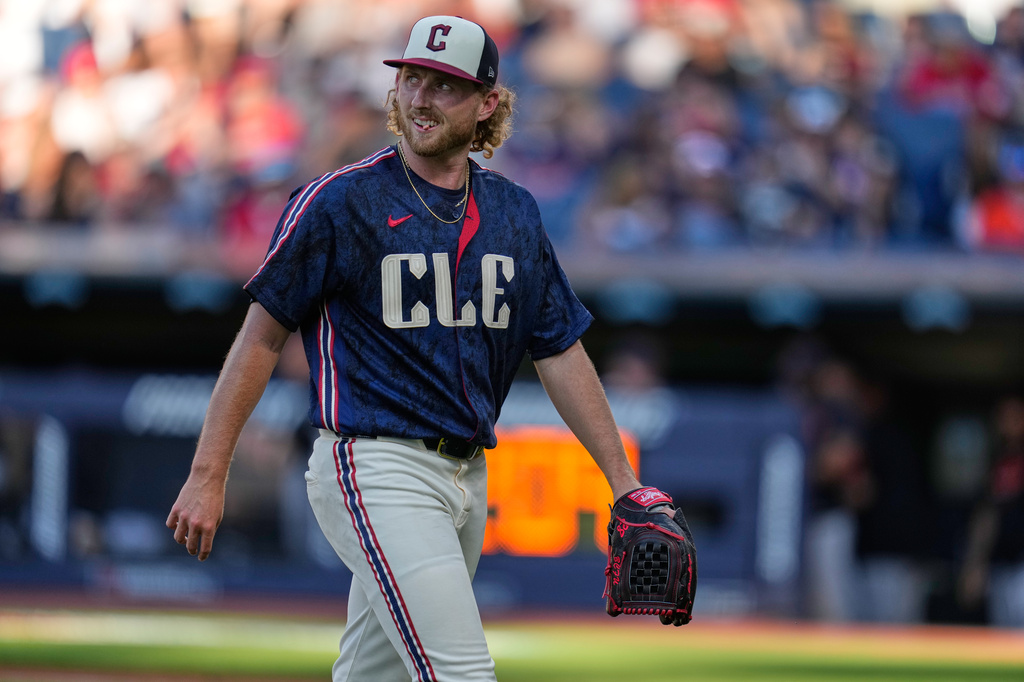 Cleveland Guardians' Tanner Bibee walks off the field in the first inning of a baseball game against the Detroit Tigers in Cleveland, Friday, June 12, 2026. (AP Photo/Sue Ogrocki)