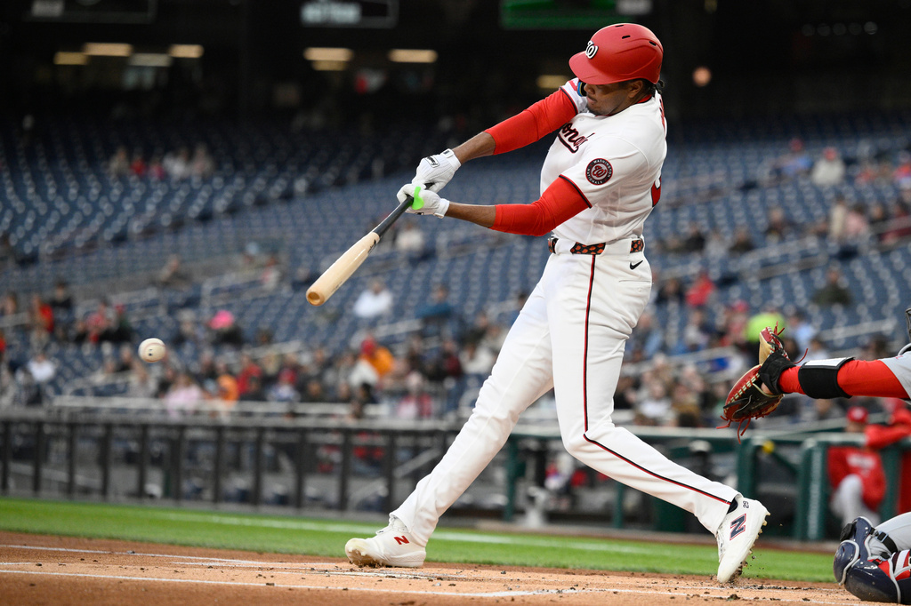 Washington Nationals' James Wood singles during the first inning of a baseball game against the St. Louis Cardinals, Monday, April 6, 2026, in Washington. (AP Photo/Nick Wass)