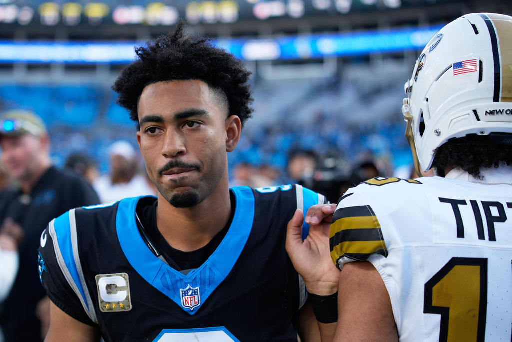 Carolina Panthers quarterback Bryce Young leaves the field after their loss against the New Orleans Saints in an NFL football game, Sunday, Nov. 9, 2025, in Charlotte, N.C. (AP Photo/Jacob Kupferman)
