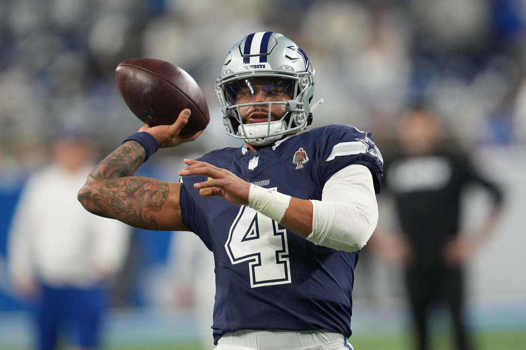 Dallas Cowboys quarterback Dak Prescott works out prior to an NFL football game against the Detroit Lions Thursday, Dec. 4, 2025, in Detroit. (AP Photo/Paul Sancya)