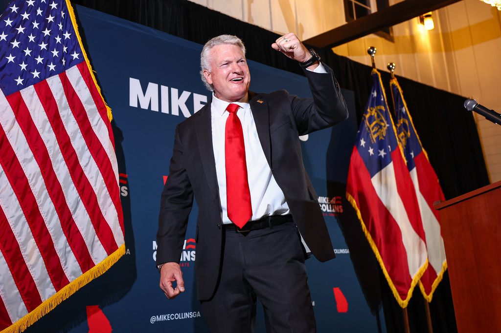 U.S. Senate candidate Mike Collins celebrates during an election-night watch party after winning the Republican nomination, Tuesday, June 16, 2026, in Jackson, Ga. (AP Photo/Colin Hubbard)