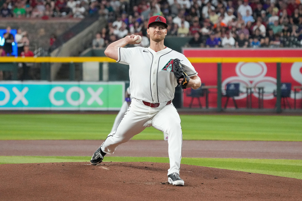 Arizona Diamondbacks pitcher Michael Soroka works against the Detroit Tigers during the first inning of an opening-day baseball game Monday, March 30, 2026, in Phoenix. (AP Photo/Darryl Webb)