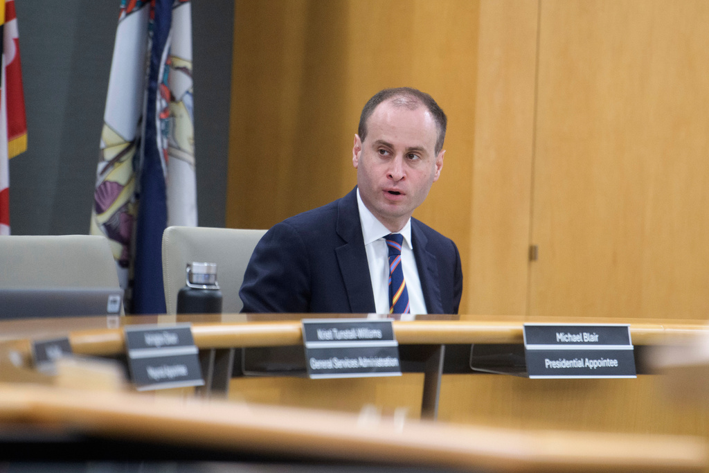 National Capital Planning Commission Chairman Will Scharf presides over a National Capital Planning Commission meeting, Thursday, Sept. 4, 2025, in Washington. (AP Photo/Rod Lamkey, Jr.)