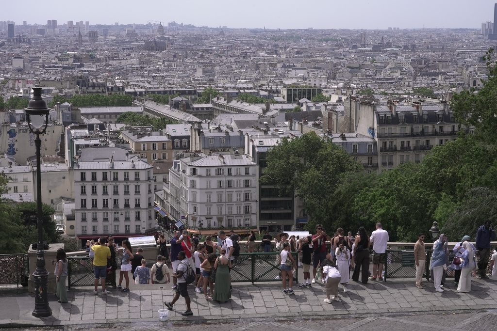 A view of roofs of Paris, Tuesday, June 23, 2026. (AP Photo/John Leicester)