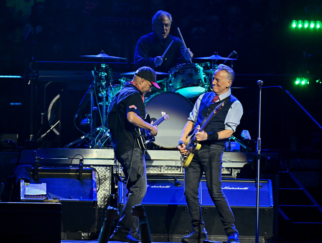 Tom Morello, from left, Max Weinberg and Bruce Springsteen perform during the "Land of Hope and Dreams" tour at Madison Square Garden on Monday, May 11, 2026, in New York. (Photo by Evan Agostini/Invision/AP)