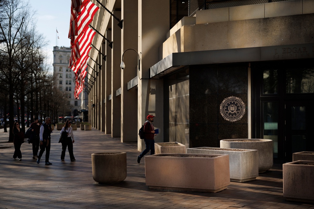 FILE - The Federal Bureau of Investigation headquarters is seen, March 21, 2026, in Washington. (AP Photo/Tom Brenner, File)