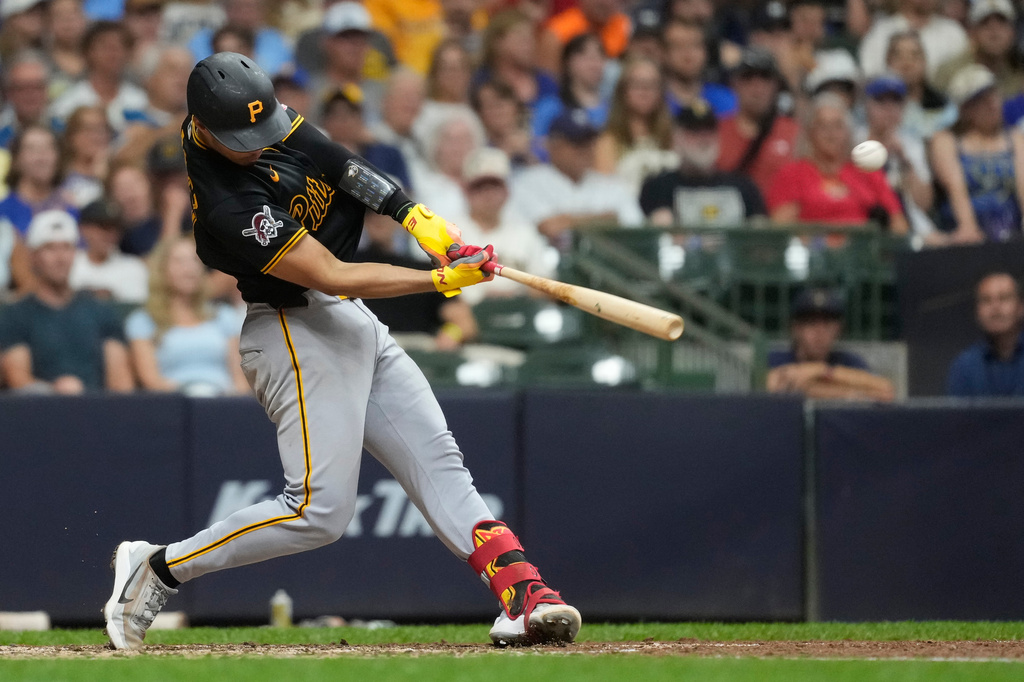 Pittsburgh Pirates' Endy Rodríguez hits a two-run home run during the seventh inning of a baseball game against the Milwaukee Brewers, Wednesday, Aug. 5, 2026, in Milwaukee. (AP Photo/Aaron Gash)