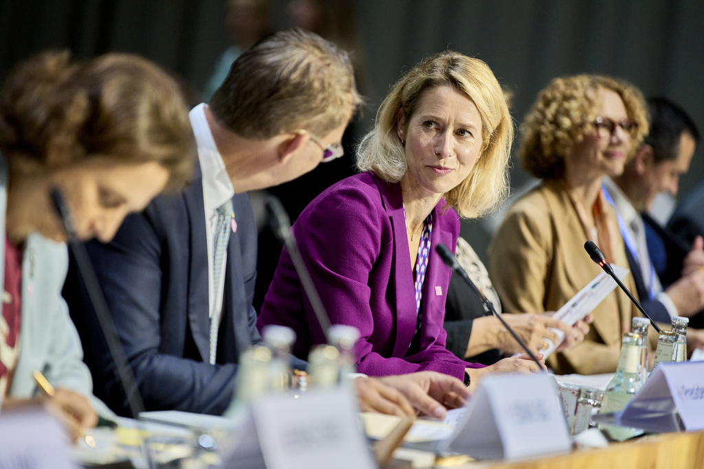 Defense Minister Troels Lund Poulsen, second from left, and Vice President of the European Commission Kaja Kallas speak at the working session for the informal EU defense ministers meeting in Forum, Copenhagen, Friday, Aug. 29, 2025. (Thomas Traasdahl/Ritzau Scanpix via AP)