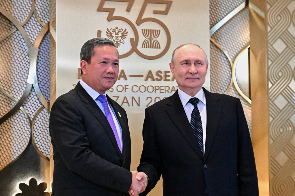 Russian President Vladimir Putin, right, and Cambodian Prime Minister Hun Manet pose for photo on the sidelines of the Russia-ASEAN summit in Kazan, Russia, Wednesday, June 17, 2026. (Sergei Bobylev/Sputnik, Kremlin Pool Photo via AP)