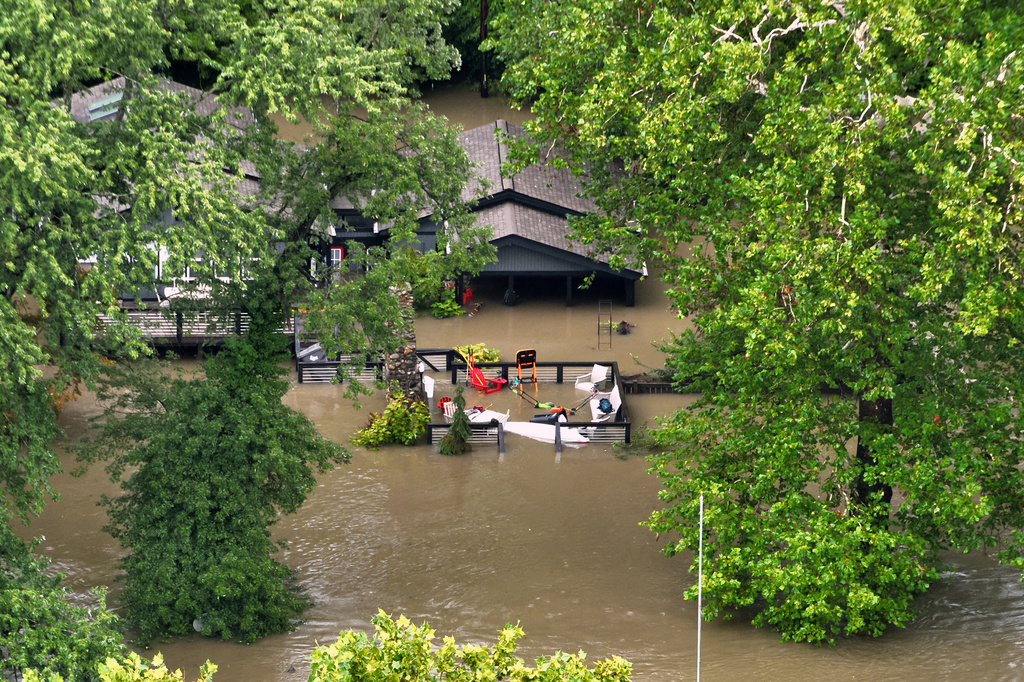 This aerial photo provided by the Indianapolis Fire Department shows flooding in northern Indianapolis, Ind., Saturday, Aug. 15, 2026. (Indianapolis Fire Department via AP)