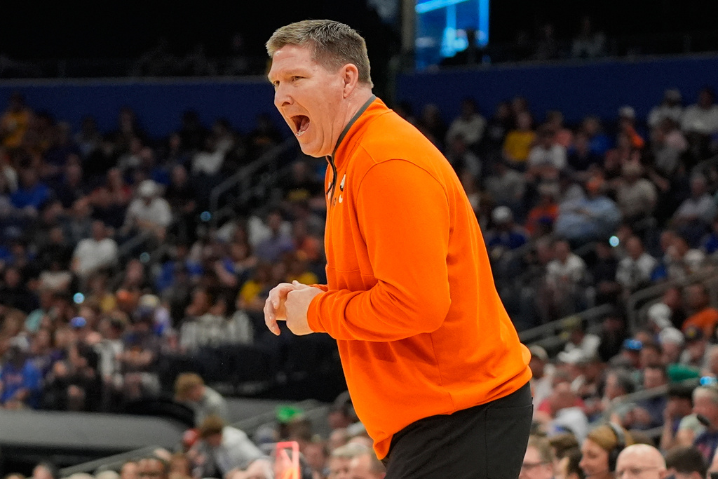 Clemson head coach Brad Brownell shouts to players during the first half in the first round of the NCAA college basketball tournament game against Iowa, Friday, March 20, 2026, in Tampa, Fla. (AP Photo/John Raoux)