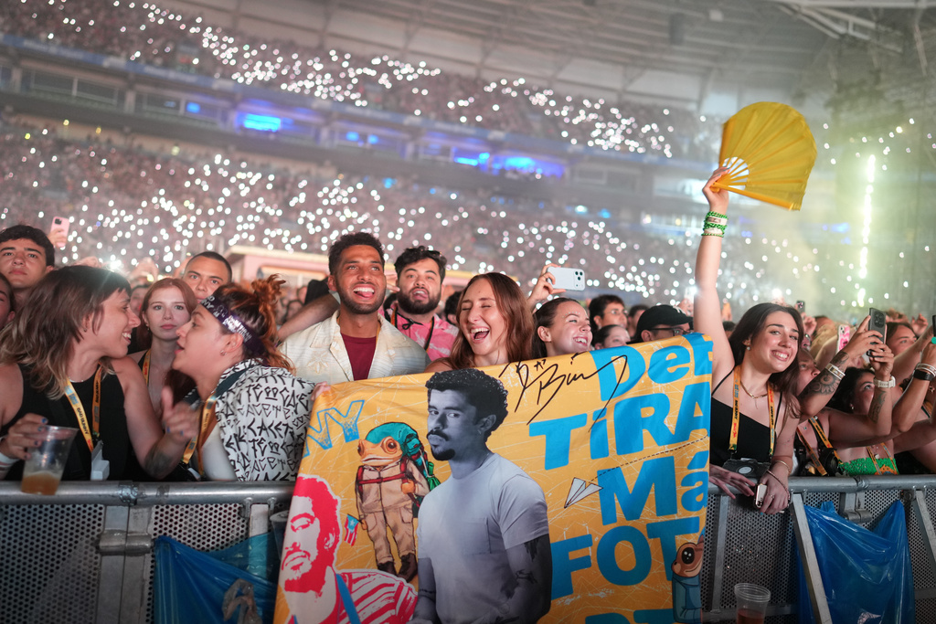 Fans cheer as Bad Bunny performs at Allianz Parque stadium in Sao Paulo, Friday, Feb. 20, 2026. (AP Photo/Andre Penner)