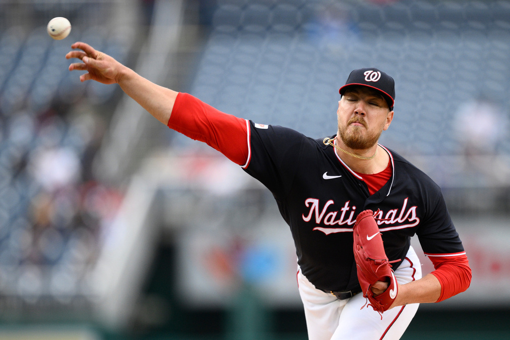 Washington Nationals pitcher Cade Cavalli throws during the third inning of a baseball game against the New York Mets, Thursday, May 21, 2026, in Washington. (AP Photo/Nick Wass)