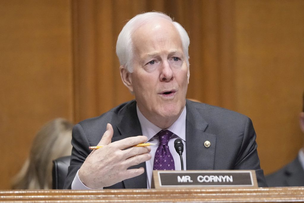 FILE - Sen. John Cornyn, R-Texas questions U.S. Trade Representative Jamieson Greer as he testifies before the Senate Finance Committee on Capitol Hill in Washington, April 8, 2025. (AP Photo/Mark Schiefelbein, File)