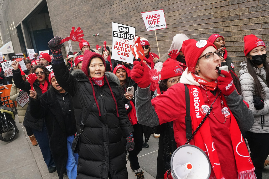 Striking nurses demonstrate outside Mt. Sinai Hospital, in New York, Wednesday, Jan. 14, 2026. (AP Photo/Richard Drew)