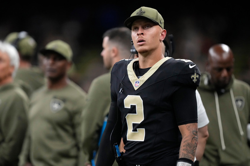 New Orleans Saints quarterback Spencer Rattler (2) looks on from the sideline after being taken out of the game against the Tampa Bay Buccaneers during the second half of an NFL football game Sunday, Oct. 26, 2025, in New Orleans. (AP Photo/Gerald Herbert) New Orleans Saints quarterback Spencer Rattler (2) looks on from the sideline after being taken out of the game against the Tampa Bay Buccaneers during the second half of an NFL football game Sunday, Oct. 26, 2025, in New Orleans. (AP Photo/Gerald Herbert)