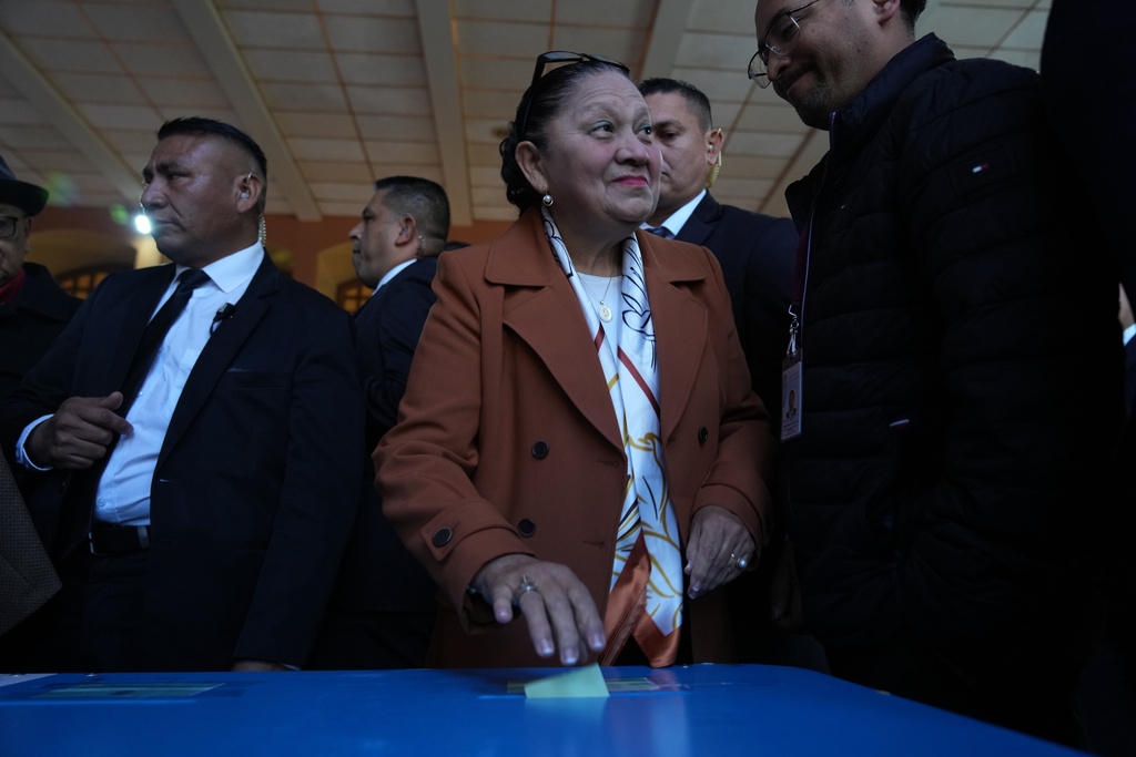 Guatemalan General Attorney Consuelo Porras casts her ballot in the election of magistrates representing the bar association on the Constitutional Court in Guatemala City, Thursday, Feb. 12, 2026. (AP Photo/Moises Castillo)