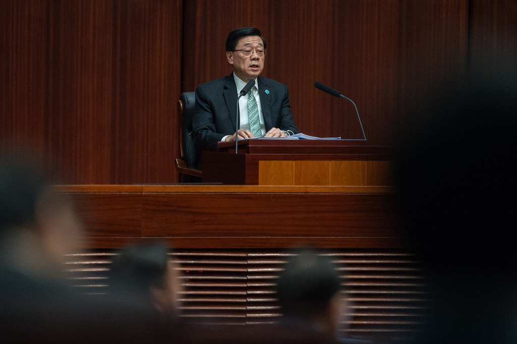 Hong Kong's Chief Executive John Lee delivers the first Five-Year Plan and policy address at the Legislative Council in Hong Kong, Wednesday, Sept. 16, 2026. (AP Photo/Chan Long Hei)