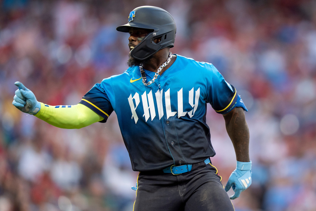 Philadelphia Phillies' Adolis Garcia reacts after his home run during the fourth inning of a baseball game against the Chicago White Sox, Friday, June 5, 2026, in Philadelphia. (AP Photo/Chris Szagola)