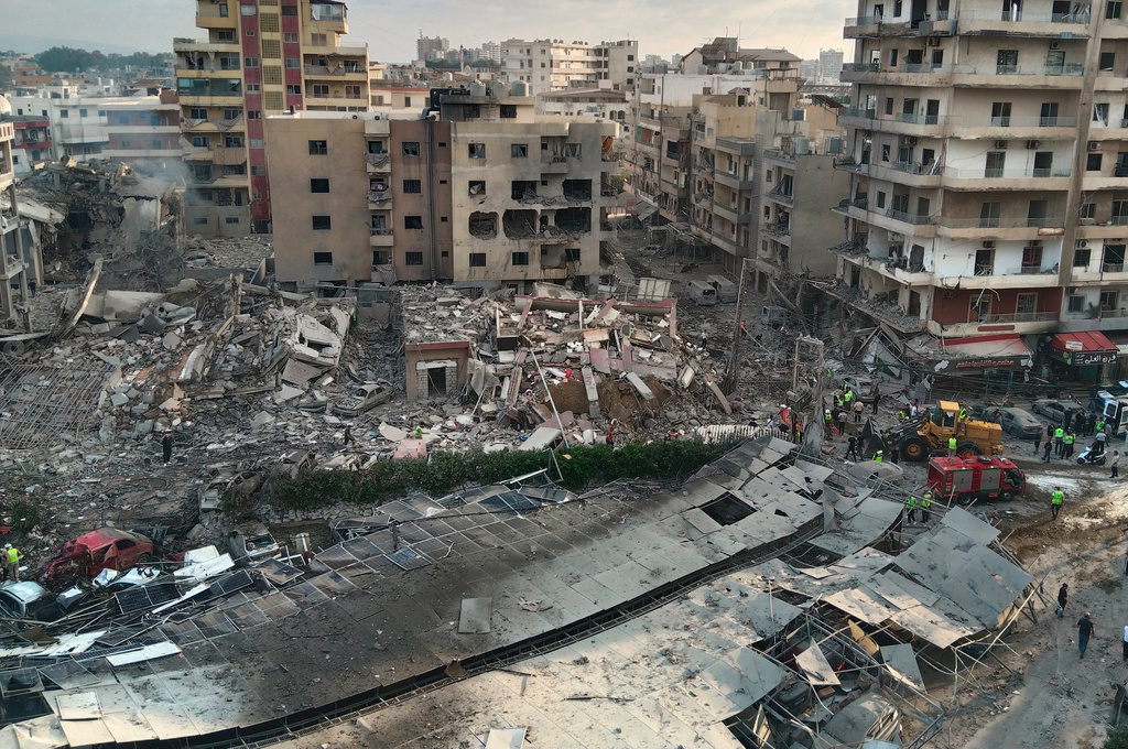 Rescuers work at the site of an Israeli airstrike that hit a building and damaged a hospital in the southern port city of Tyre, Lebanon, Monday, June 1, 2026. (AP Photo)