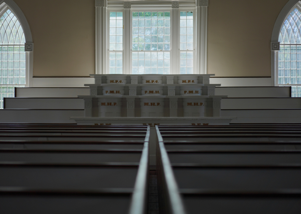 Pew boxes and pulpits in one of two assembly rooms in the Kirtland temple, a nearly two-century old sanctuary considered the first temple in the movement Joseph Smith founded, on Wednesday, June 15, 2026, in Kirtland, Ohio. (AP Photo/Jessie Wardarski)