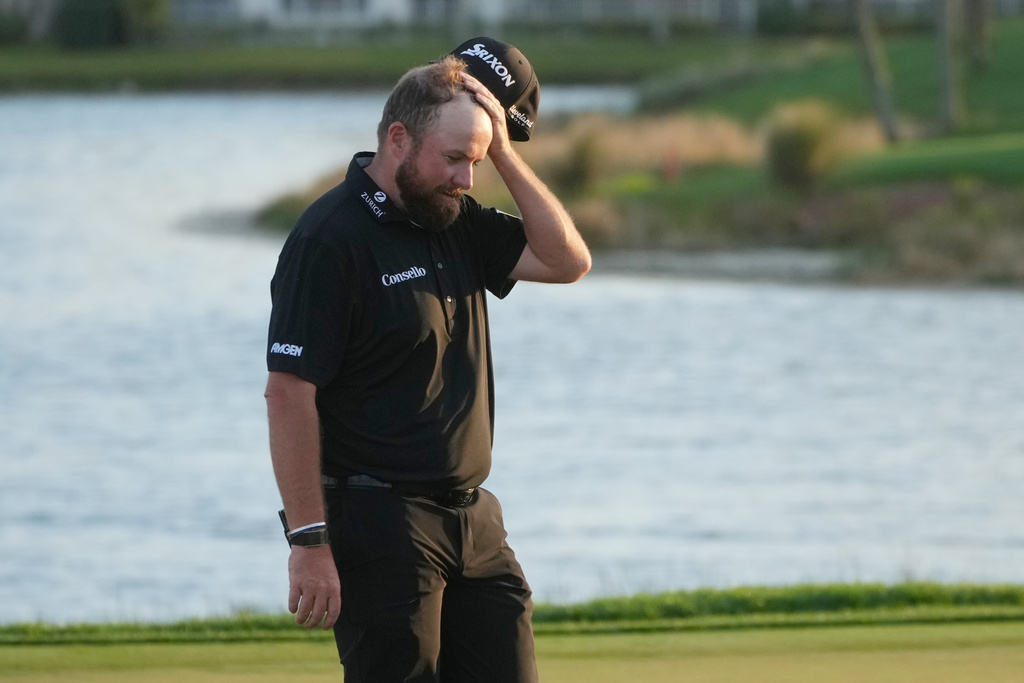 Shane Lowry of Ireland walks off the 18th green during the final round of the Cognizant Classic golf tournament, Sunday, March 1, 2026, in Palm Beach Gardens, Fla. (AP Photo/Marta Lavandier)